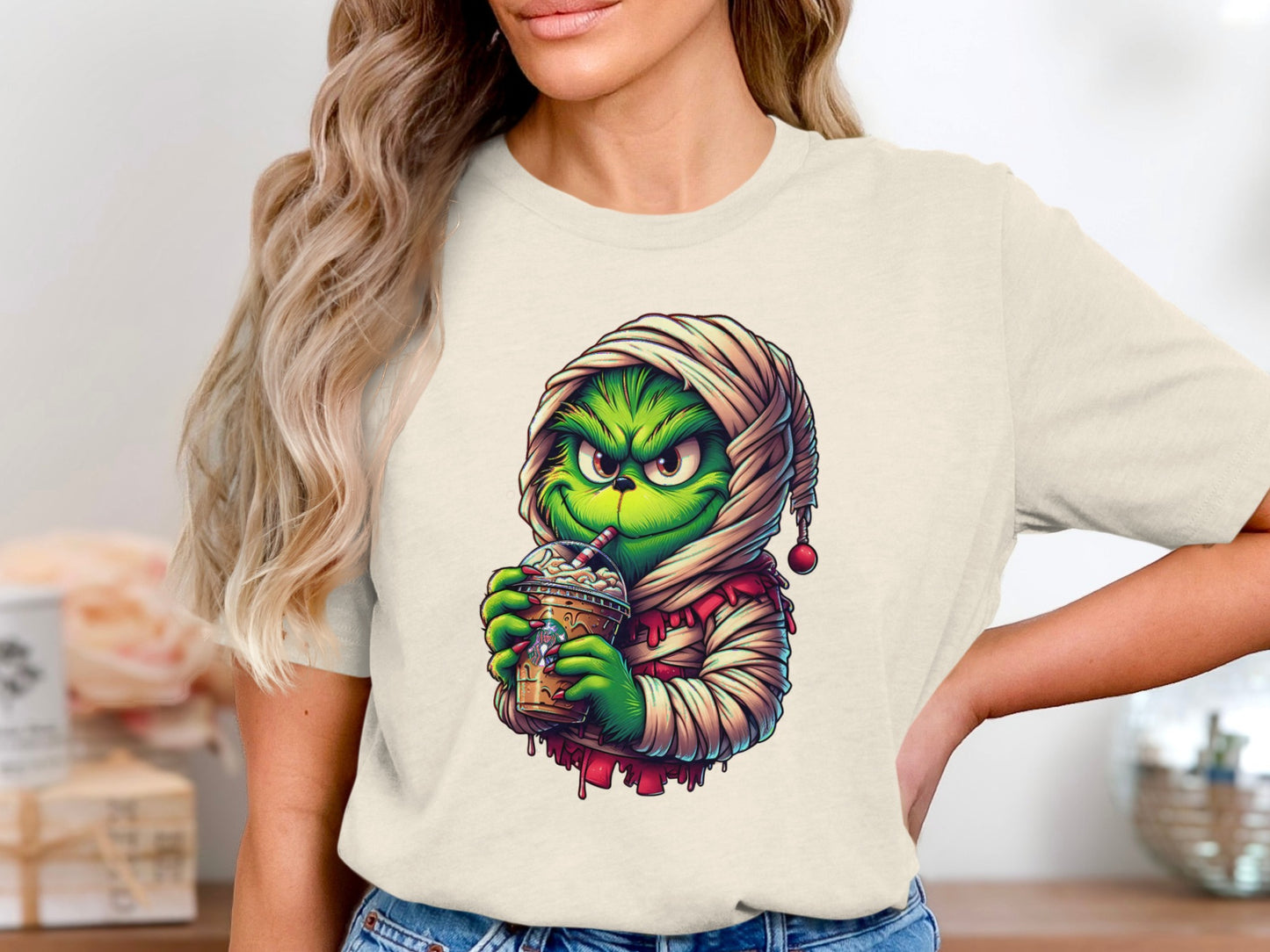 Festive Grinch Drinking Coffee Graphic Tee product type