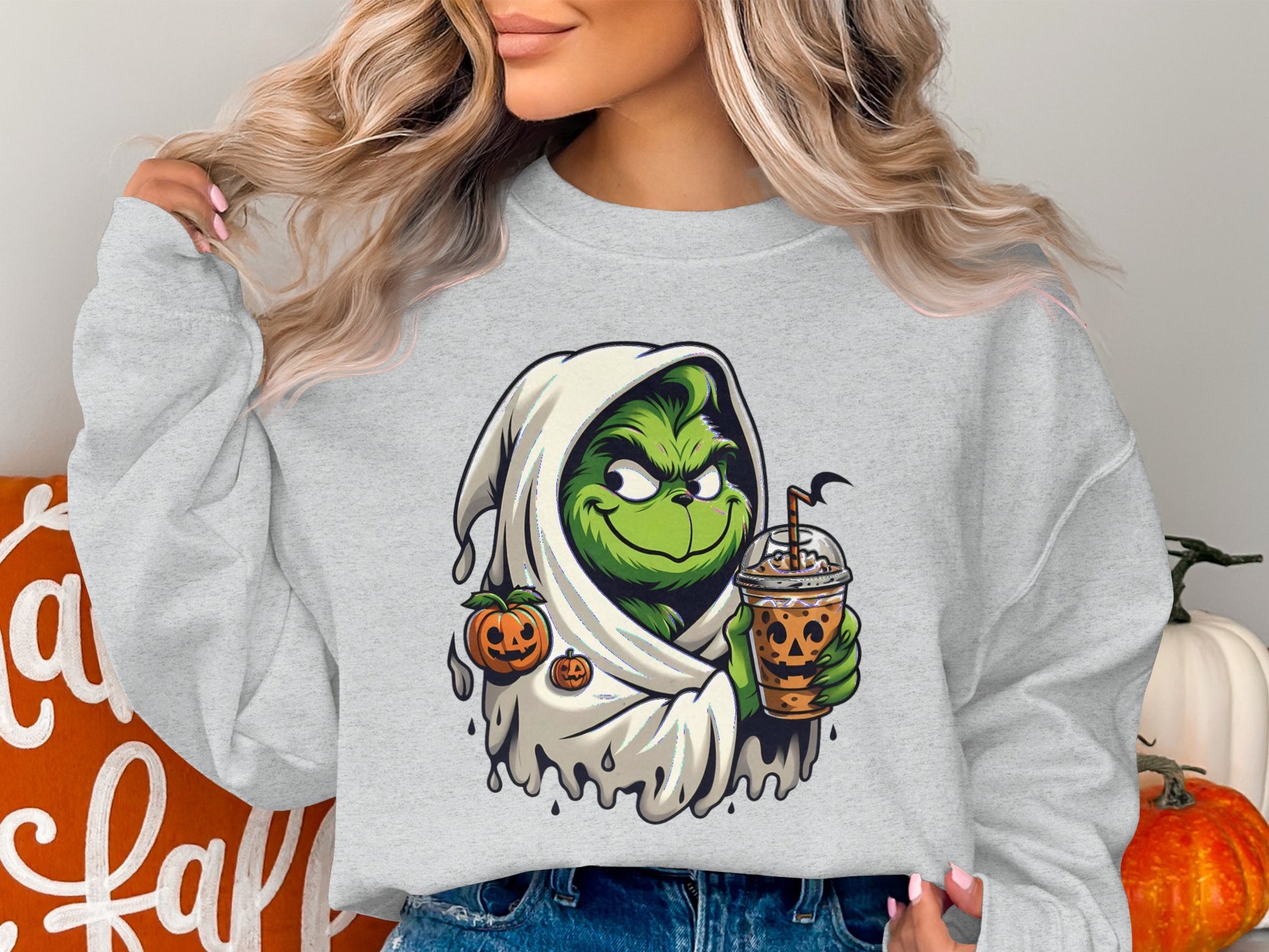 Festive Halloween Grinch Sweatshirt for a Fun Product