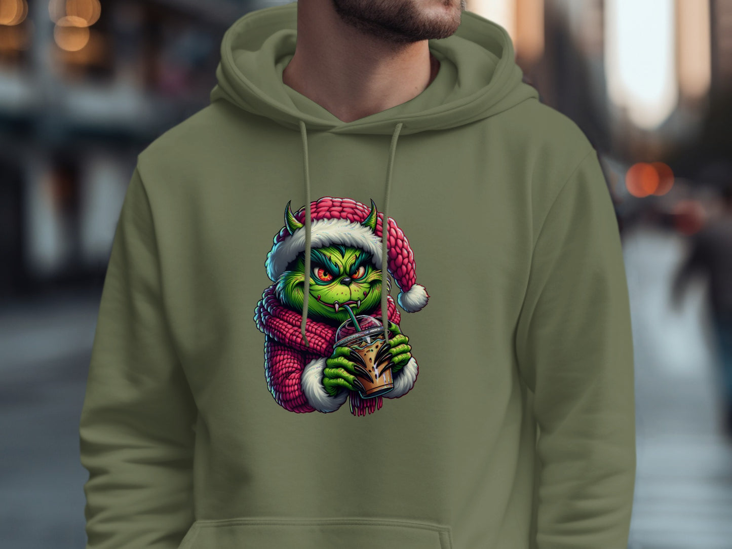 Festive Green Creature Drinking Cocoa Hoodie product