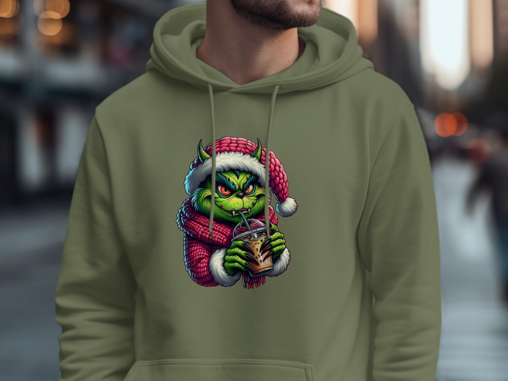 Festive Green Creature Drinking Cocoa Hoodie product