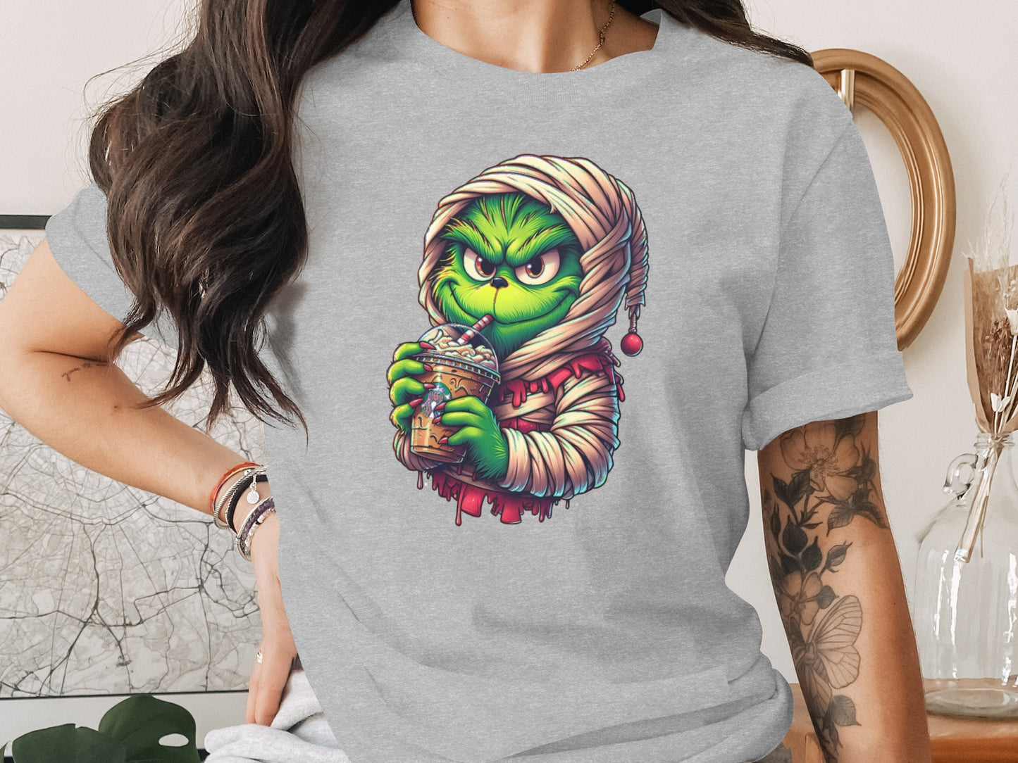 Grinch Holding Beverage Graphic T-shirt product