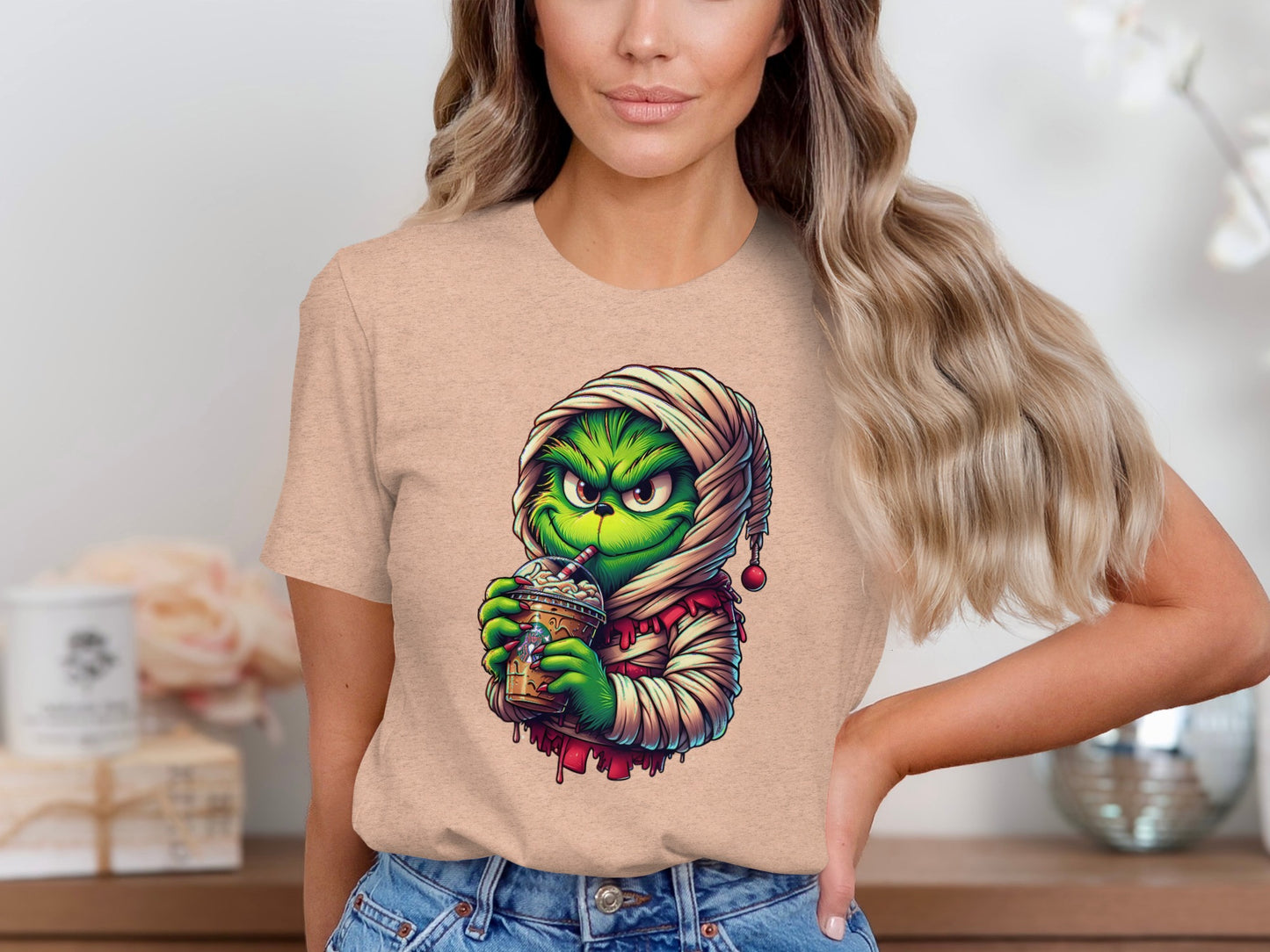 Mummy Grinch Drinking Cocoa Graphic Tee product type