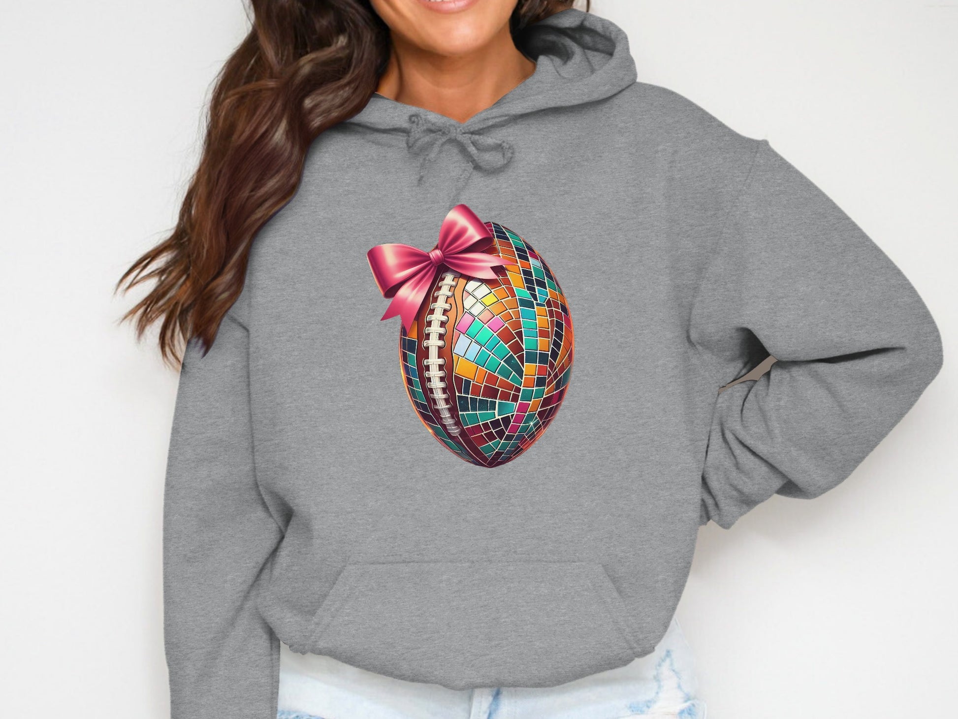 Vibrant Rugby Ball with a Bow Print Hoodie product type