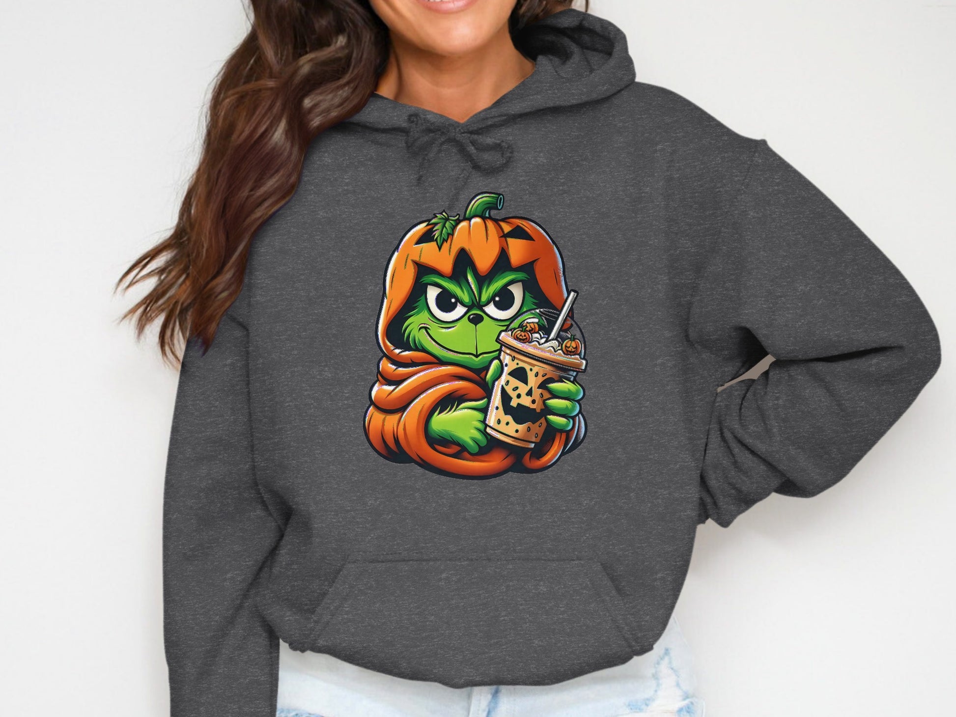 Grinch Pumpkin Holding Drink Graphic Hoodie product type